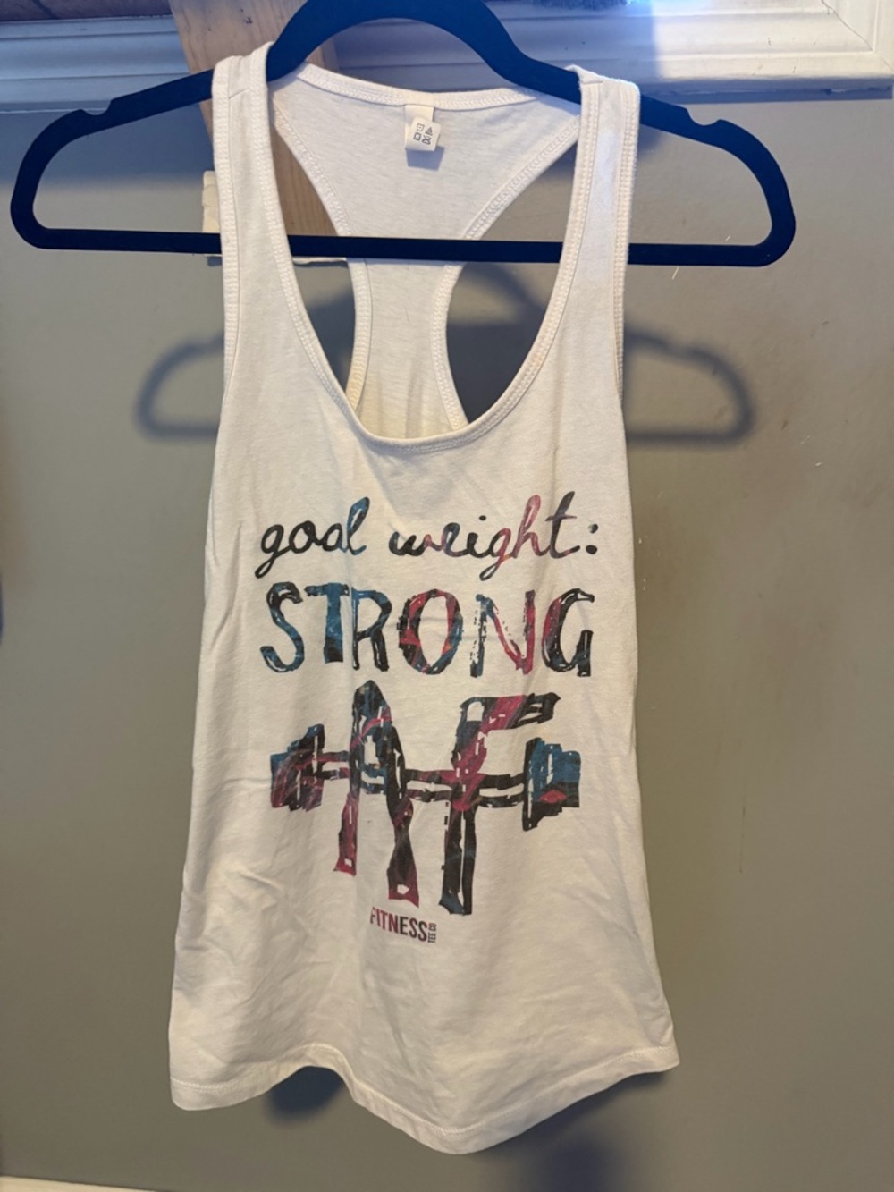 Next Level Apparel White Racerback Tank Top with Multicolor 'Strong AF' Graphic